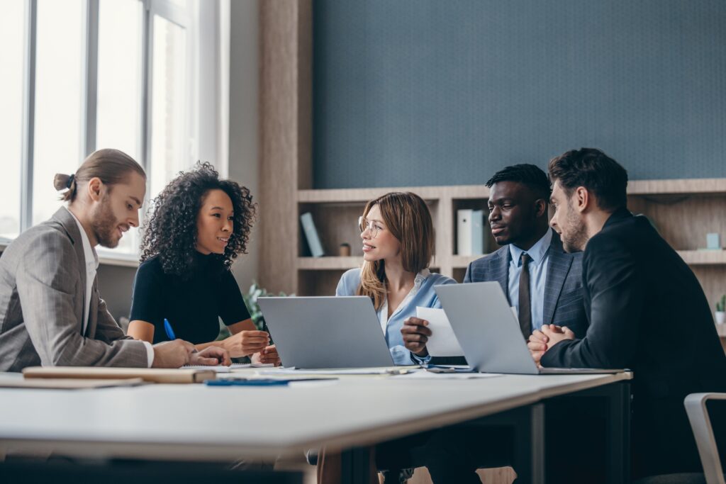Direct marketers having a team meeting