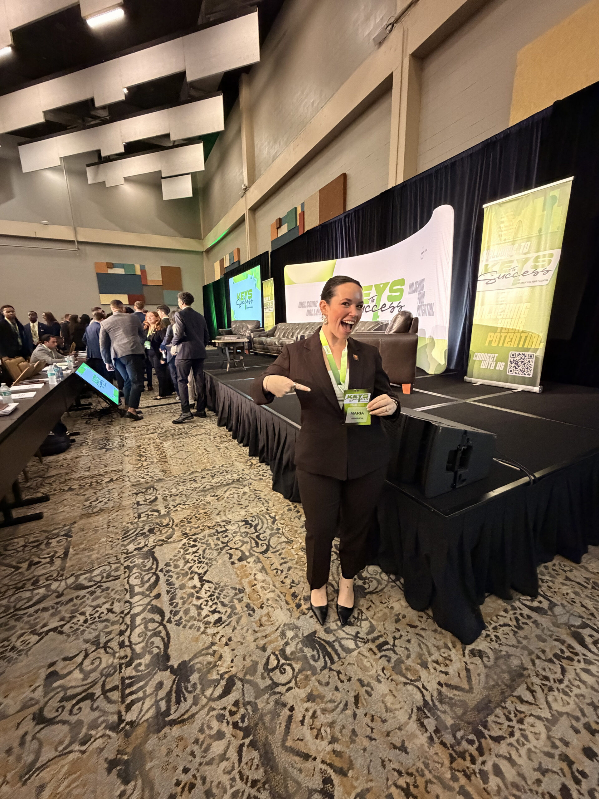 A professional at a business event, capturing authentic brand engagement in action.